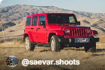 Red jeep in the highlands